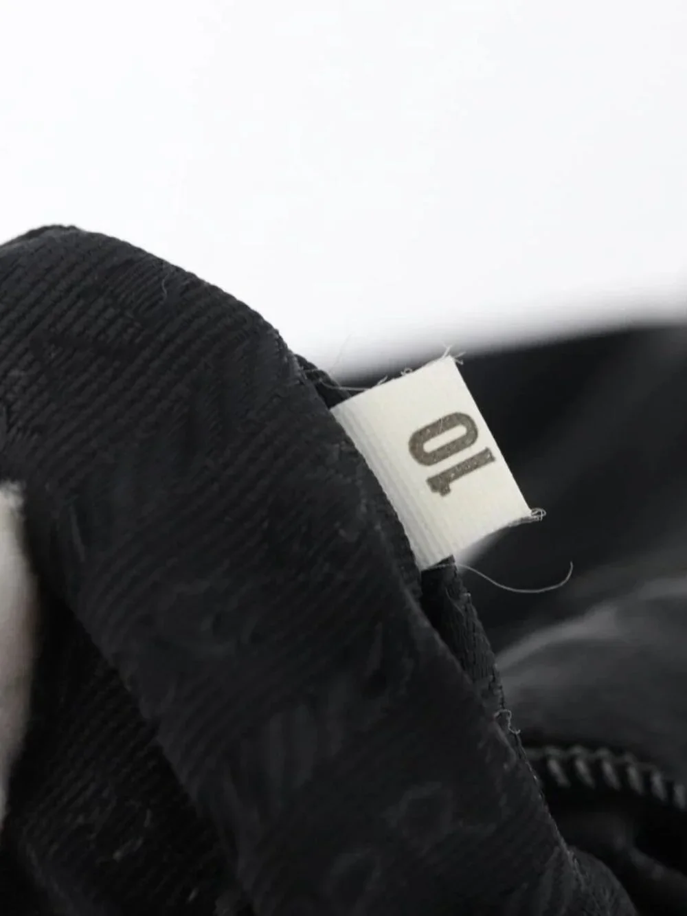 Prada brand	prada color	black